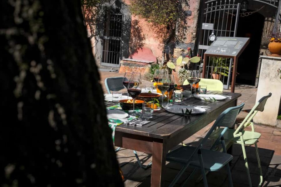 Catania: Etna Urban Winery Sicilian Lunch with Wine Tasting - The shared-table Sicilian meal: antipasti to secondo