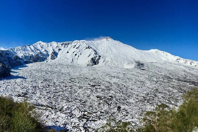 Etna Tour in 4x4 - Grotta dei Tre Livelli (or similar): helmets, lights, and a real sense of scale
