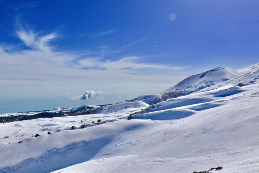 Piano Provenzana: Guided Mt. Etna Snowshoeing Trek - At the top outlook (~2,200m): snow-covered Etna with active gases